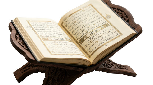 Open ancient book on wooden stand with candlelight