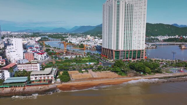 Nha Trang, Vietnam - Aerial view of the coastal city with its modern skyscrapers and ongoing construction projects along the Cai River. , Nha Trang, Vietnam.