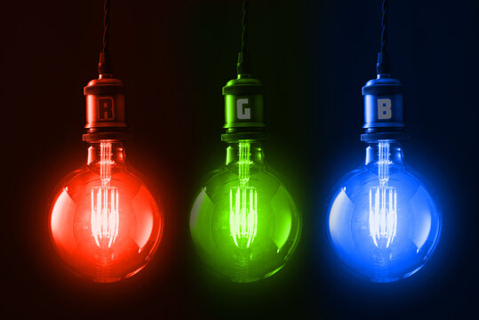 RGB Light Bulbs Concept Red Green Blue Glow Illuminated Lamps on Dark Background