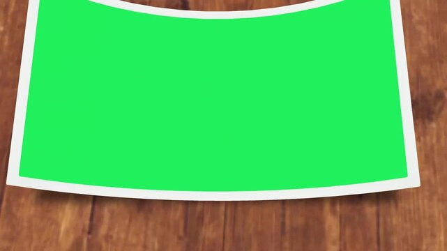 Animation green picture frame on wood floor.