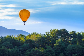 Naklejka premium Hot air balloon flying in sky. Provence in France. Tourism and adventure concept.
