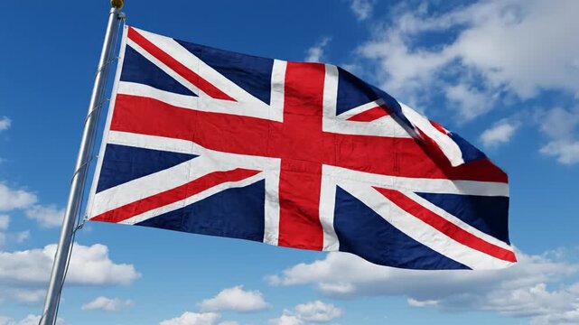 Union Jack Flag Waving in the Wind Against a Blue Sky.