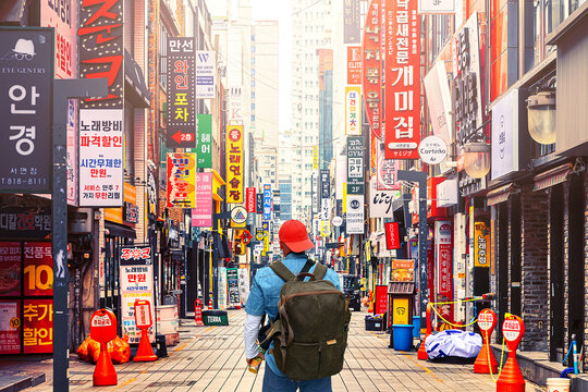 South Korea, Busan - March 30, 2026: A traveler observes the life of a big city in the center