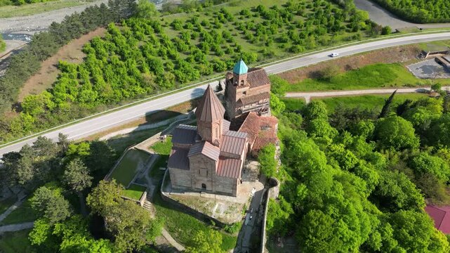 Aerial view of Gremi Monastery, a historic architectural complex in the Kakheti region, with surrounding landscape.