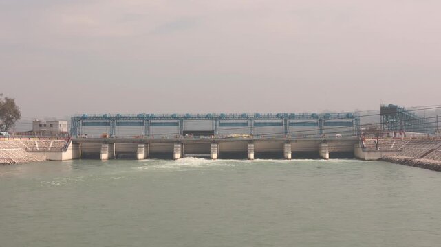 Raw 4K footage of Har Ki Pauri Ghat canal in Haridwar Uttarakhand, showing sacred river flow, spiritual atmosphere, and famous pilgrimage destination in India.