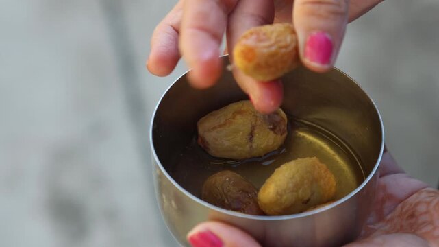 Raw 4K footage of soaked dates being eaten in the morning, showing healthy diet, natural nutrition, and simple daily routine in an Indian lifestyle setting.