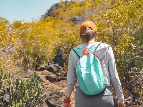 Closeup hiker with mint backpack, creator perspective