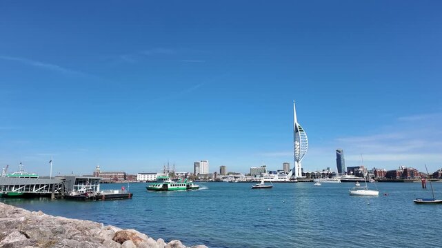 Gosport Hampshire England UK. 28.04.2026. Video.  Passenger ferry crossing Porstmouth Harbour into The Gosport ferry terminal, Green and white vessel underway.