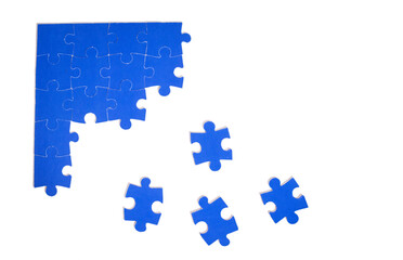 Fototapeta premium Blue puzzle nearly complete, one piece missing 