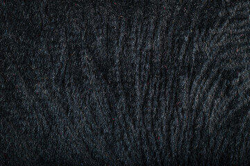 Black velvet fabric texture background for sofa upholstery and luxury interior design. © Renhue