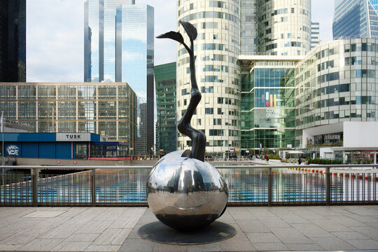 Paris, France - March 9, 2026. A compelling shot of the Point Croissance (Growth Point) sculpture by South Korean artist Lim Dong-lak, located at the heart of the La D&eacute;fense business district in Paris