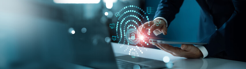 Fototapeta premium Cyber security,Businessman using fingerprint scanning unlock and access to business data network, Biometric identification, cyber security protect business transaction from online digital cyber attack