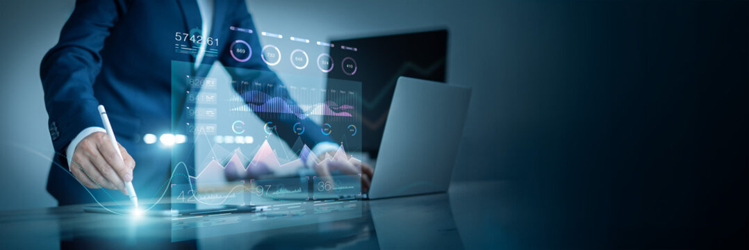 Businessman uses virtual smart dashboard analyzing business data and Data Management System with KPI and financial banking  growth graph chart report. Planning and business strategy, Digital marketing