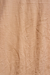 Fototapeta premium The surface of a pastel orange crew neck t-shirt.