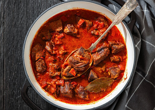 Beef goulash stew with paprika in ceramic pot