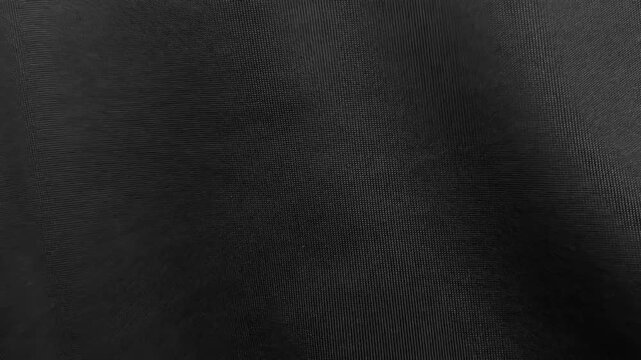 High-quality black wrinkled paper texture animation with stop-motion effect. Features professional studio lighting and minimal shadows for a clean look.