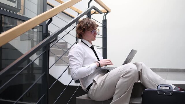 Remote worker using laptop works online outside office space managing tasks and communication with digital tools showing flexibility independence and modern work lifestyle