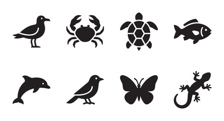 Fototapeta premium A graphic collection of black silhouette icons featuring various animals like a seagull, crab, turtle, fish, dolphin, bird, butterfly, and lizard on a white background.