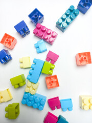 Fototapeta premium Children's Lego toys on a white background