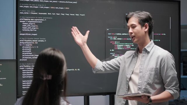 Programmer software developer engineer meeting indoor office project coding progression presentation update security database data analysis business technology support concept