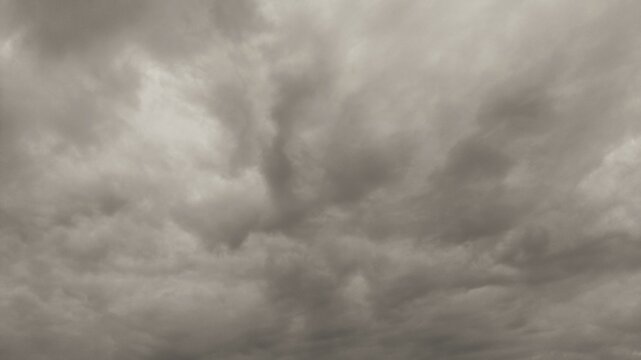 Dramatic overcast sky with heavy grey storm clouds before rain