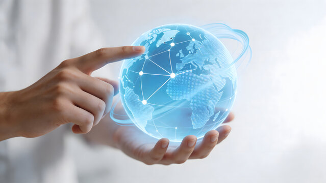 Hand holding digital globe with network connections