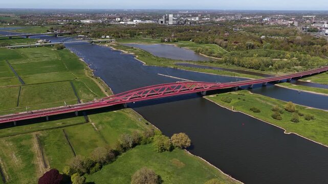 Aerial view of the red hanzeboog railway bridge near zwolle