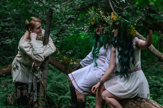  Rusalka in white with a wreath on her head and green hair