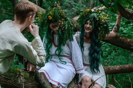 Rusalka in white with a wreath on her head and green hair