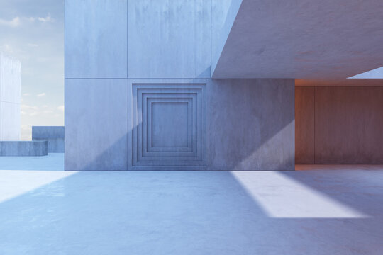 Minimalist outdoor concrete building exterior with geometric facade details and dramatic light and shadow in open space. 3D Rendering