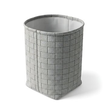 Empty woven laundry basket isolated on white background