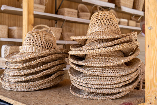 straw hats on a market