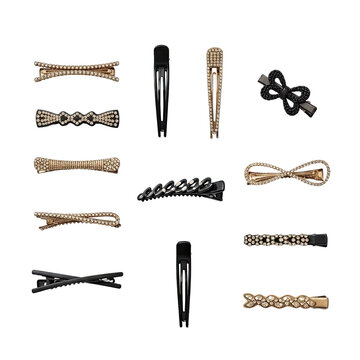 A collection of various decorative hair clips and barrettes on a white background.
