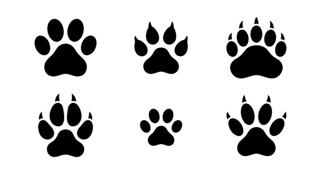 vector set of black dog and cat paw prints on white background suitable for graphic design projects such as logos or icons