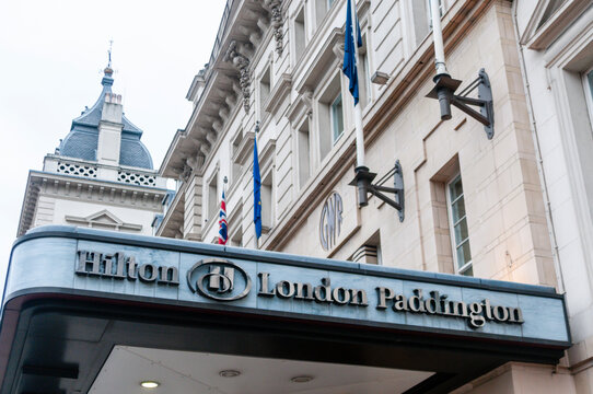 The towering glass and concrete facade of the Hilton London Metropole on Edgware Road, a prominent upscale business and leisure hotel located in Central London near Paddington.