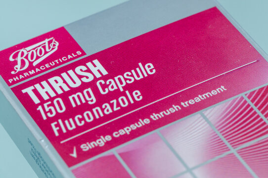 Box of Fluconazole 50mg antifungal capsules from Boots pharmacy, a common medication used to treat thrush, displayed on a clean surface in clinical packaging.