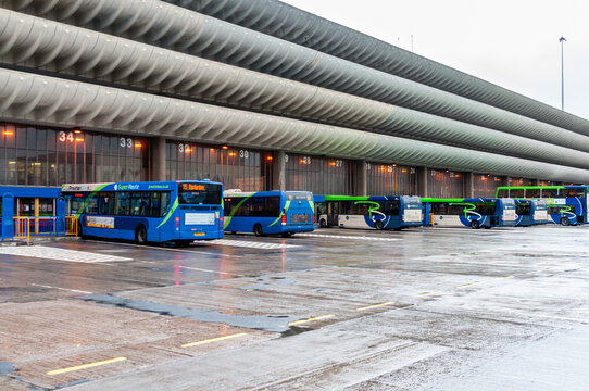 Iconic Grade II listed Brutalist Preston Bus and Coach Station in Lancashire, England, featuring its distinctive curved concrete multi-storey car park structure and expansive transport concourse.
