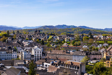 Fototapeta premium Panoramic view of the Sainte-Marie district and its cathedral from the heights of the Sainte-Croix district in Oloron-Sainte-Marie