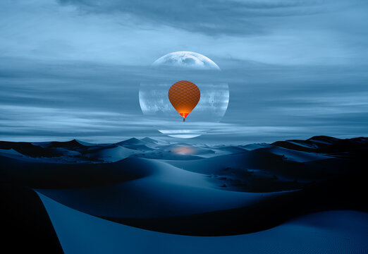 Hot air balloon flying over beautiful sand dunes in the Sahara desert - Sahara, Morocco