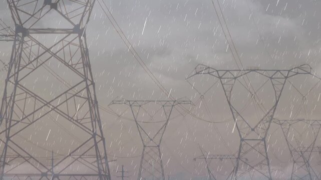 Camera pulling back starting raindrops shifting while towers revealing bases showing stormy scene