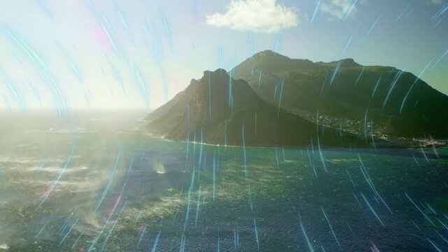 Low sun glare starting blue-green streaks sweeping frame while headland holding, simulating flare