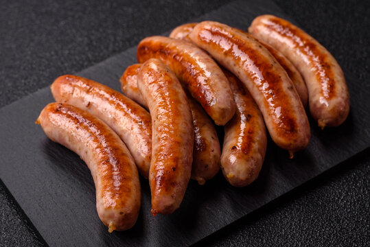 Grilled or barbecued chicken sausages for the dinner table. Grilled sausages