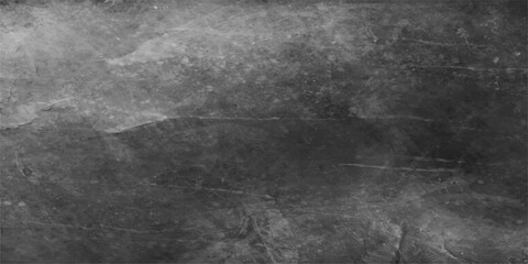 Fototapeta premium An aged vintage paper texture with a dark black and white grunge pattern on a rough grey concrete wall surface for a dirty stone background