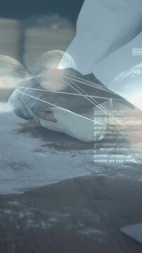 Vertical video: baker pressing dough, sparking orbs, lines and HUD, shaping boule for baking