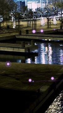 Vertical video: Purple hex markers pulsing over dock and water on night scan, mapping dock for AR