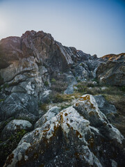 Obraz premium Rock formation with lichen at Praia do Paraiso Portugal coastline