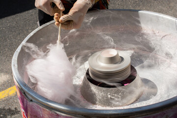 Fototapeta premium Making cotton candy on the street