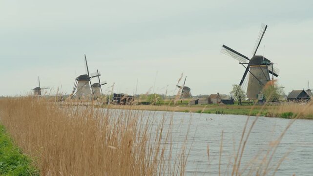 Famous Travel Destinations. Attractive View Windmills and canal in Kinderdijk 