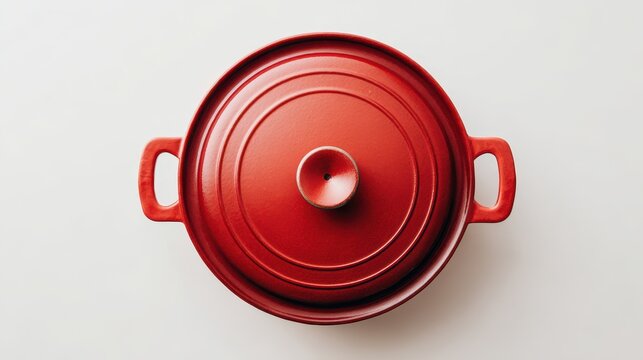 Red dutch oven cooking pot viewed from above isolated on white background
