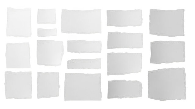 Collection of various sizes and shapes torn paper scraps with ragged edges for creative design and montage.
